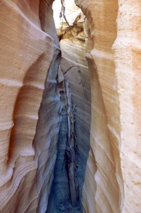 Slot Canyon Access After a stroll down (no, not up--it's backwards here) a wash, you access the slot via this knotted rope. Looks scarier than it in fact is. Take heart!