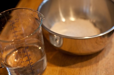 Rye Dough Mixing a dough-paste of rye flour and water for sealing the seams.